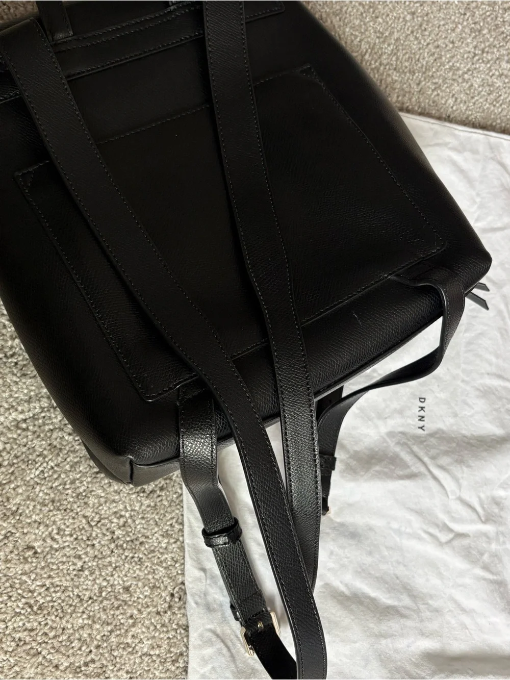 DKNY Black Leather Backpack with Gold Accents